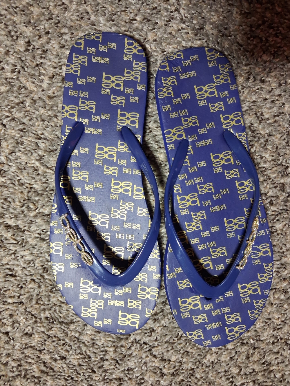 bebe Blue and Gold Logo Flip Flop Sandals